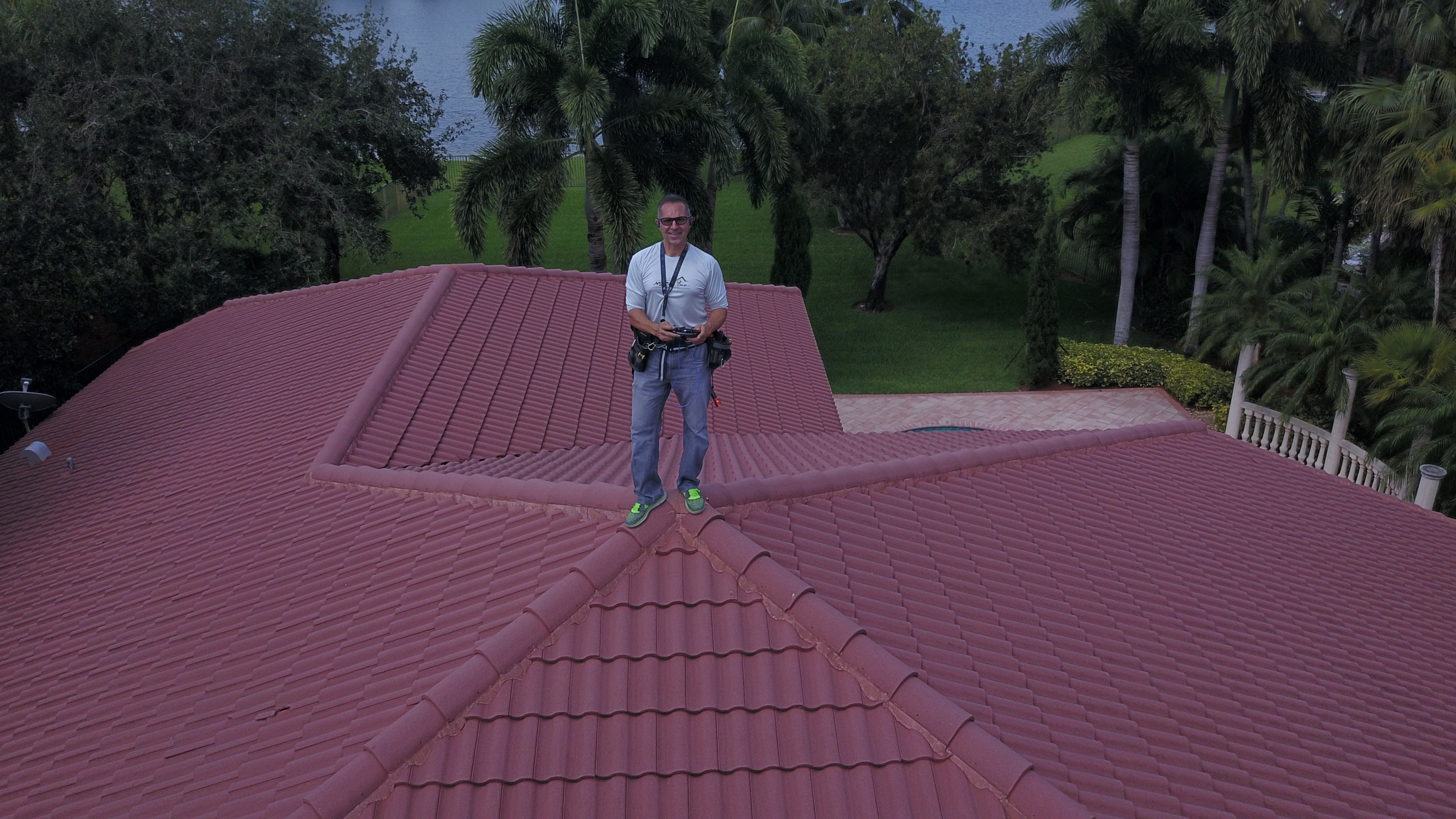 Nicholas J. Catalano performing roof inspection work